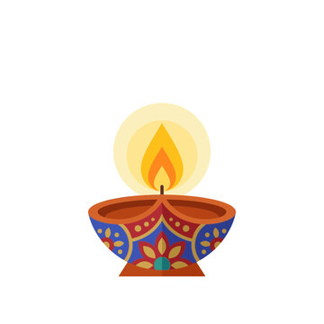 Traditional lit diya oil lamp with floral pattern for Diwali festival celebration