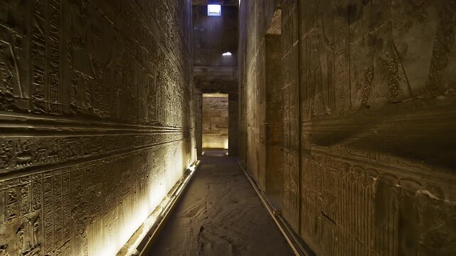 Mystical Corridors of the Ancient Egyptian Temple of Edfu. Edfu is the site of a Ptolemaic-era Temple of Horus and an ancient settlement in Egypt.