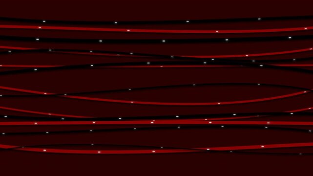 Abstract animation of glowing red strands and white particles flowing horizontally across a dark background.