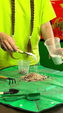 Woman prepares potting substrate with perlite for indoor plants, houseplant repotting, soil aeration, gardening preparation, healthy root care.
