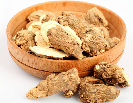 Fresh slices of Butea superba root in a wooden bowl, featuring a natural textured medicinal herb, organic traditional remedy, healthy plant extract, alternative wellness ingredient, botanical