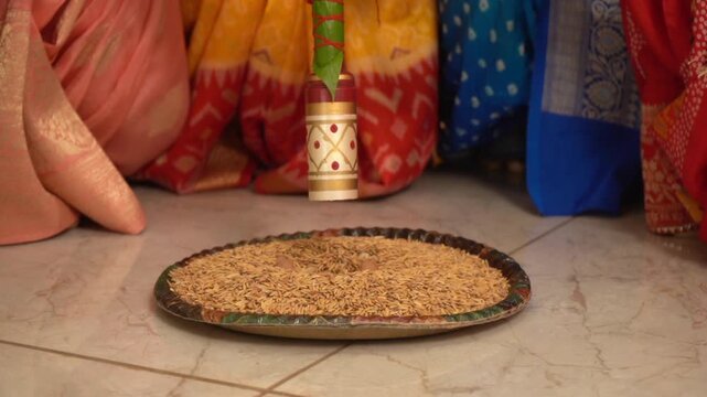 Indian people celebrating worshiping during pooja or ritual ceremony