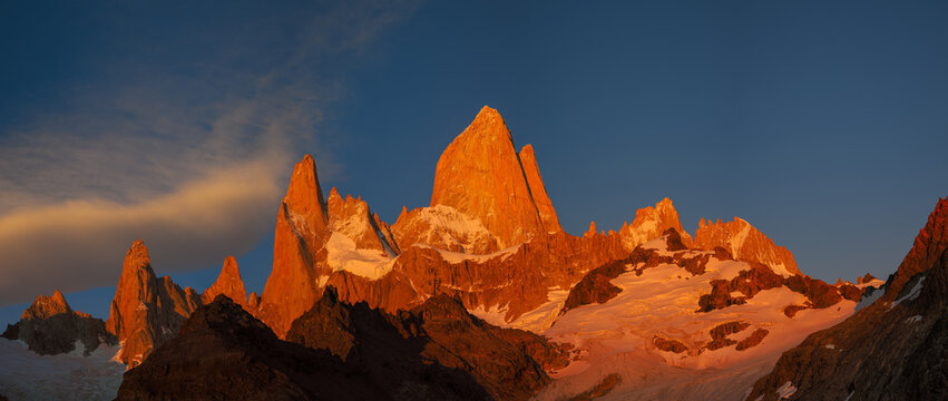Mount Fitz Roy glowing at sunrise in Patagonia, copy space huge panorama 100mpx