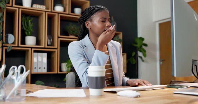 Tired, woman and yawn in business with computer, typing HR report and fatigue from payroll deadline. Black person, burnout and long hours in office with pc, review timesheet and human resources work.