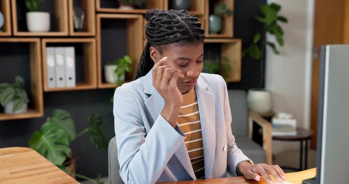 Tired, woman or headache in office with computer, financial crisis or stress for risk of liquidation. Exhausted, black person and typing in business with pc, migraine or worry for bankruptcy problem.