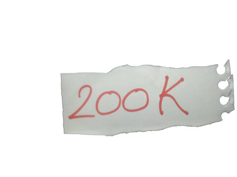 A small piece of paper with the handwritten text 200k written in red ink isolated on transparent background