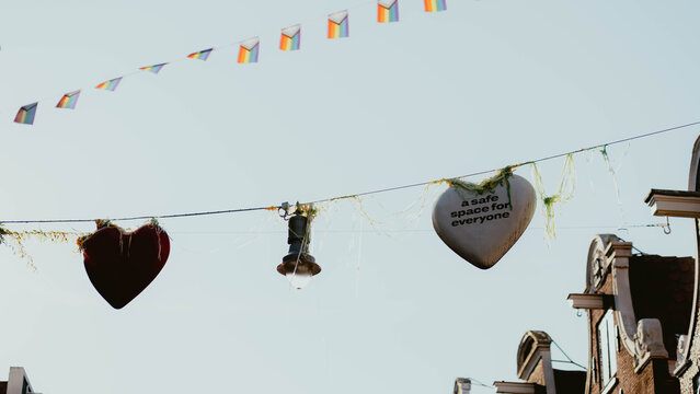 Decorative hearts and flags promoting inclusivity and safety
