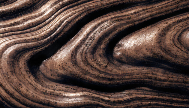 A very dark and brown swirl pattern