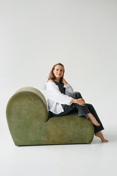 Woman Resting Soft Green Velvet Sofa