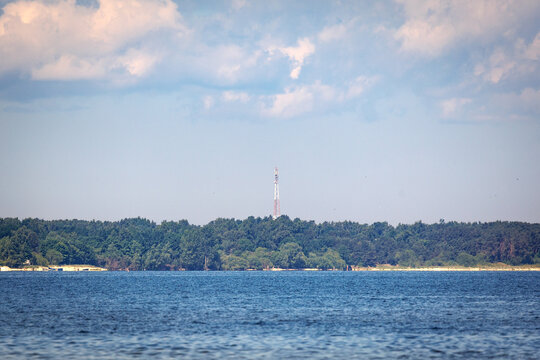 Coastline and forest across the Gulf of Riga from Jaunkemeri beach, Jurmala city on a Baltic Coast, Latvia