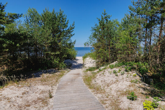 Boardwalk through coastal dunes to Jaunkemeri beach in Jurmala, Latvia