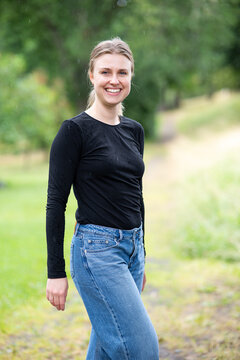Portrait of beautiful smiling blonde young woman 