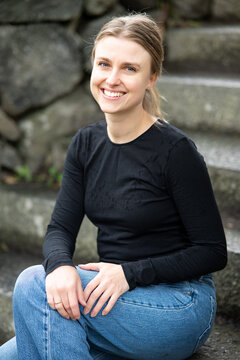 Portrait of beautiful smiling blonde young woman 