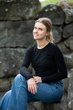 Portrait of beautiful smiling blonde young woman 