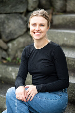 Portrait of beautiful smiling blonde young woman 