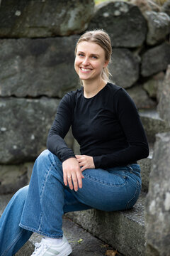 Portrait of beautiful smiling blonde young woman 