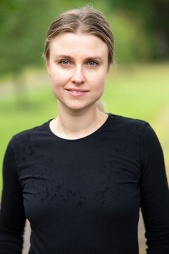 Portrait of beautiful smiling blonde young woman 