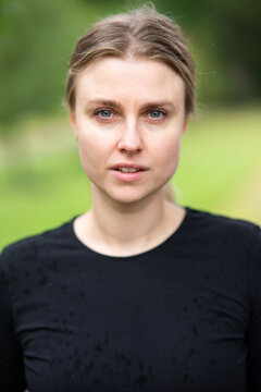 Portrait of beautiful smiling blonde young woman 