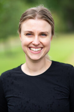 Portrait of beautiful smiling blonde young woman 