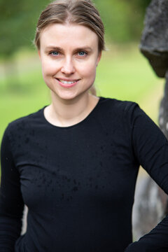 Portrait of beautiful smiling blonde young woman 