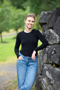 Portrait of beautiful smiling blonde young woman 