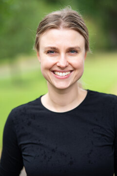 Portrait of beautiful smiling blonde young woman 