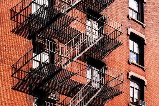 fire ladder at old houses downtown in New York
