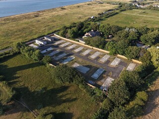 Aerial drone 4K view of Leasowe beach stretching beside warm glowing greenland Leasowe Wirral © Wirral Views