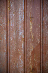 Obraz premium Weathered wooden panels convey rustic charm in a sunlit room with a vintage atmosphere