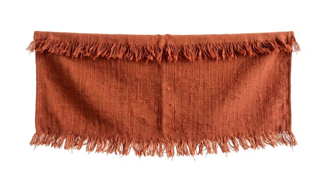 Terracotta colored woven cotton fabric scarf with fringed edges isolated on white background