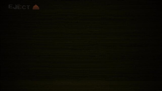 4K eject VHS tape video on black background, eject VHS animation eject VHS video tape screen on black background. 