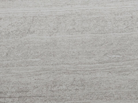 Natural gray stone surface texture with subtle mineral patterns and realistic concrete detail. This abstract background is suitable for architecture, interior design, construction materials, wallpaper
