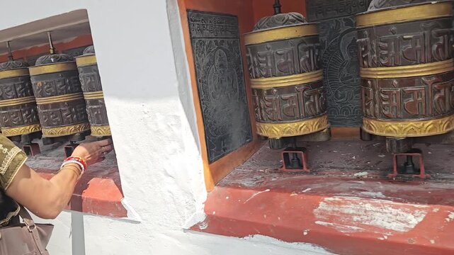 Large Tibetan Buddhist Prayer Wheels, Ornate Mani Wheels with Buddhist Mantras Along Temple Walkway, Spiritual Religious Practice, Buddhism, Himalayan Culture and Heritage