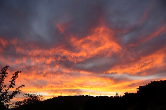 deep orange sky with dramatic sunset