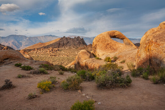 Beautiful scenic panorama of Mobius Arch at sunset in Alabama Hills