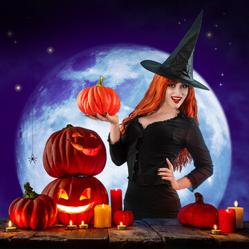 Witch on Halloween. Female wizard fairy character for All Saints' Day. Fantasy gothic red-haired Vampire girl in black dress. Enchantress dressed in carnival costume