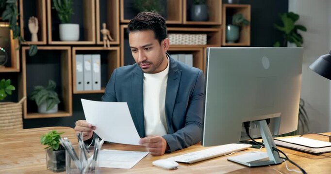 Review, paper or man in office with computer, expense analysis or research on funding pitch. Reading, tech or finance advisor with document, budget control or report draft on investment proposal.