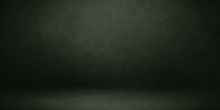 Green studio background with overhead spotlight creating circular glow on floor for product presentation in professional photography scene setup idea