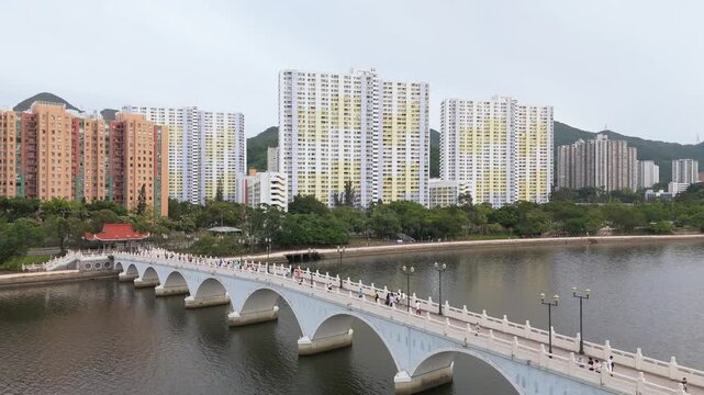 Aerial view of Lek Yuen Bridge across Shing Mun River with residential buildings in Shatin, Hong Kong