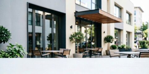 Fototapeta premium Modern Cafe Outdoor Seating Area with Plants and Glass Facade for Urban Lifestyle Design