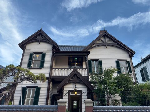 Historic western-style house under blue sky in Kobe, Japan