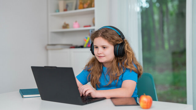 Class online webinar creates smart schooling. Class meeting shows focused homeschool education. Young girl uses class computer screen. Home workspace keeps class studying.