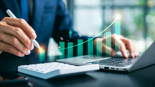 Financial expert leveraging advanced technology for strategic growth analysis, forecasting market trends, and developing innovative solutions for future business success and economic prosperity