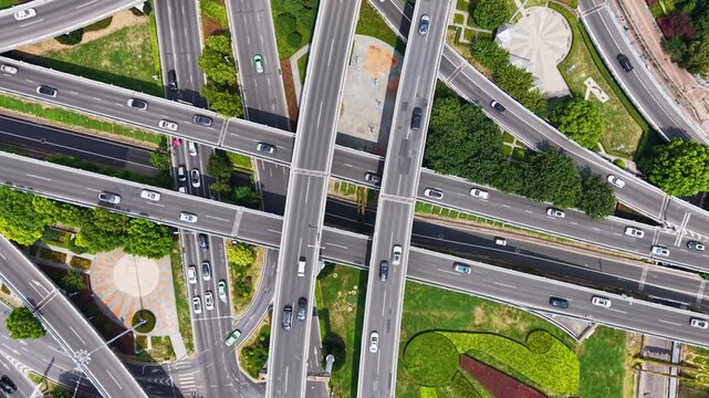 Top‑down aerial view of complex multi‑level urban highway interchange