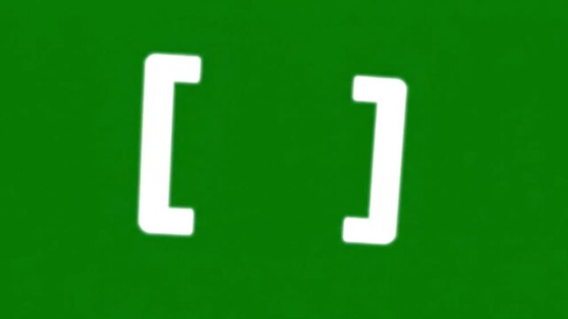 A video showcasing a simple green screen with white bracket symbols for coding and design purposes.