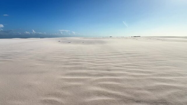 Pale Rippling Sand Flats Beneath a Blue Horizon at Len&ccedil;&oacute;is Maranhenses