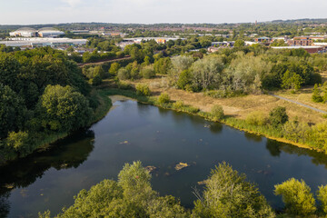Fototapeta premium Aerial Image of Parson's Meadow Lake and Wigan Landscape