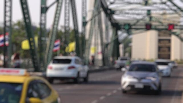 Bokeh view of road traffic in Bangkok, Thailand. Blurred background footage.