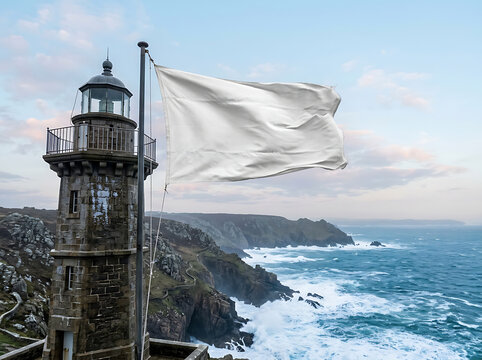 Lighthouse on a rocky coast with a white flag waving in the wind