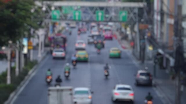 Bokeh view of road traffic in Bangkok, Thailand. Blurred background footage.